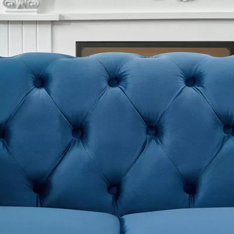 Canapé Chesterfield en velours avec accoudoirs roulés et clouté