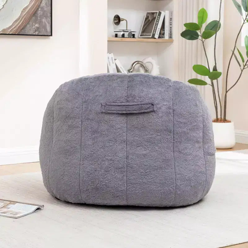 Pouf poire moderne en fausse fourrure avec accoudoirs